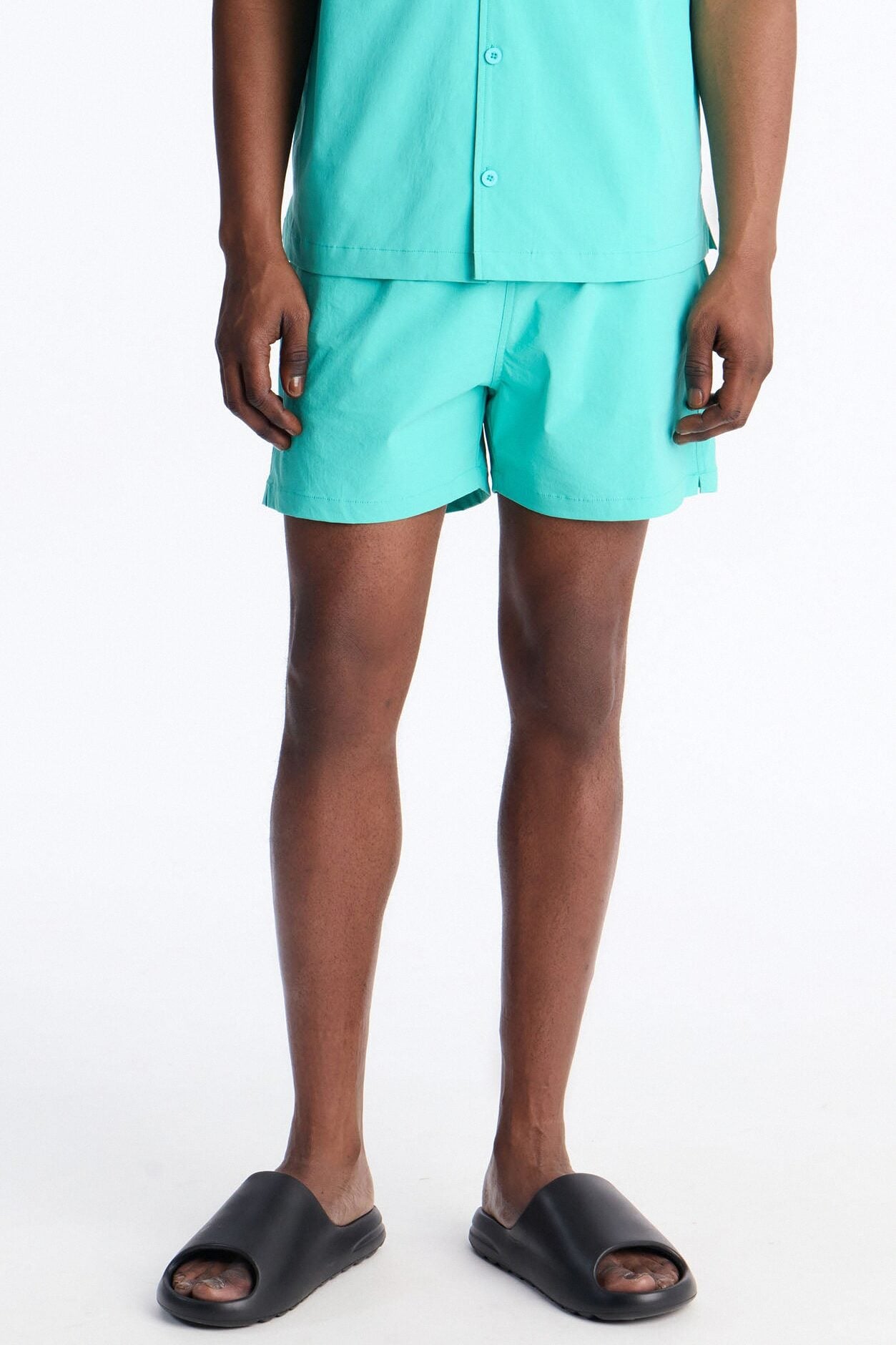 Montez Stretch Swim Trunk 4″ - Teal image 1