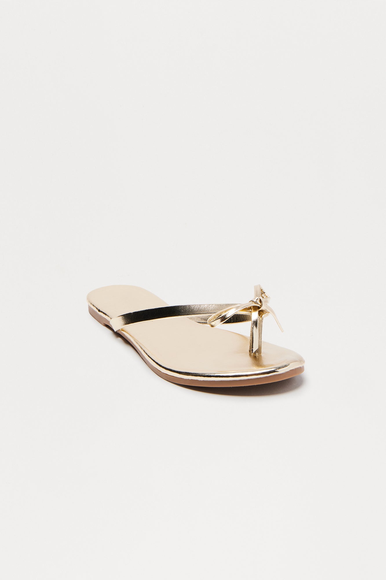 Coral Bow Flip Flops - Gold