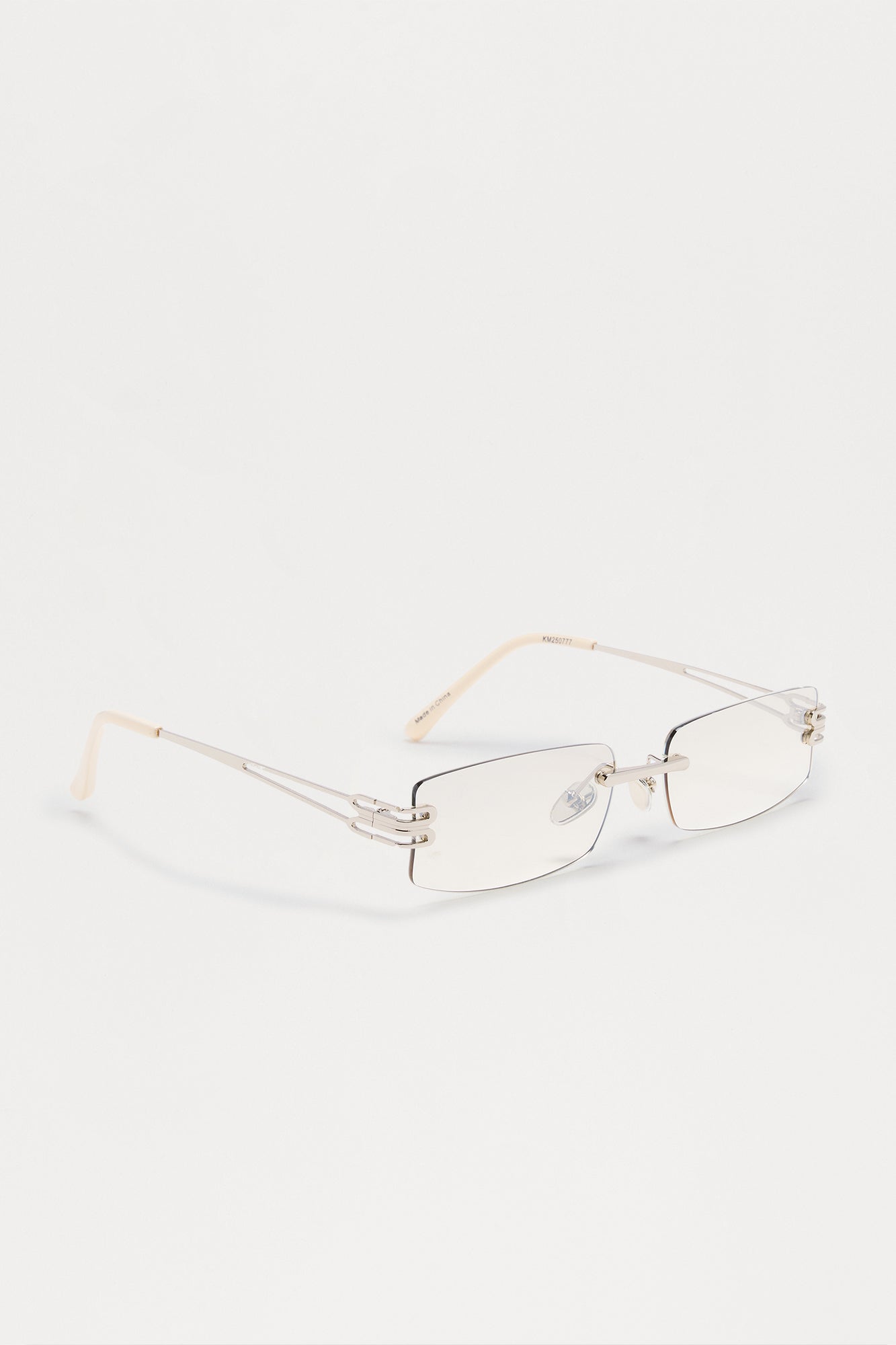 Sleek Frameless Metal Sunglasses - White