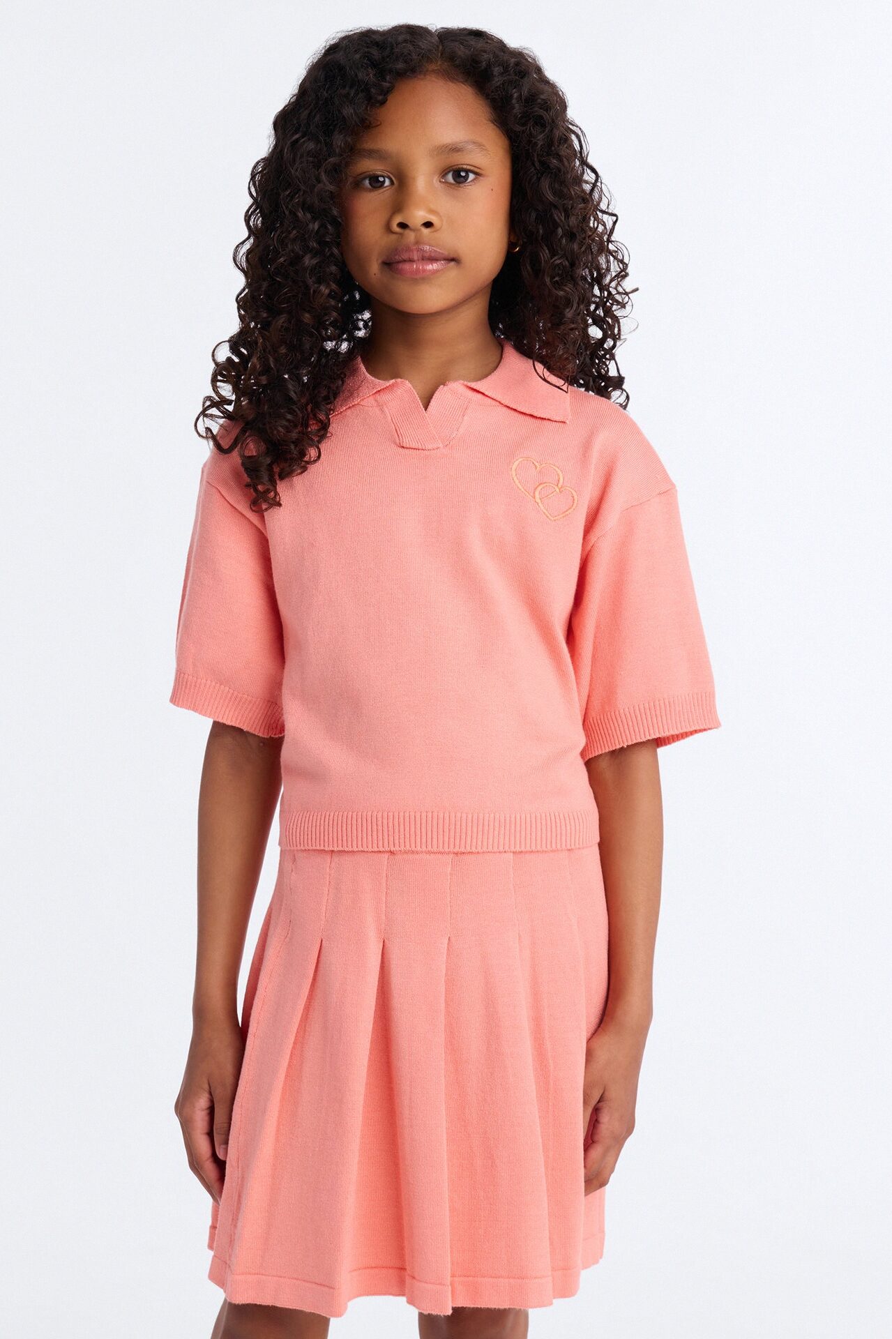 Mini Heartbeats In Harmony Pleated Mini Skirt Set - Coral